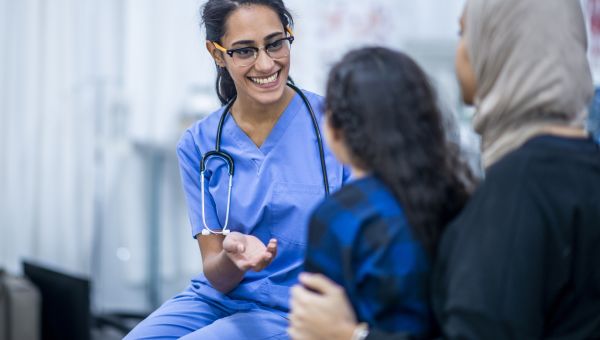 mom and daughter visiting provider