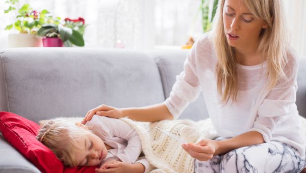 mother comforting sick child, sick child, child sickness