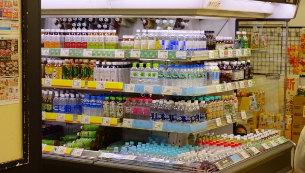 shelf of bottled drinks in store