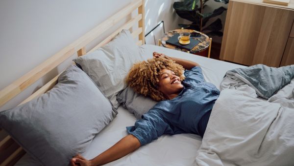 woman waking up in bed