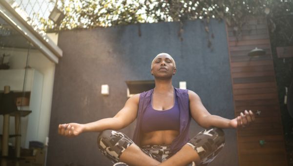 woman meditating outside