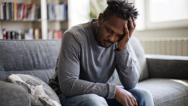 stressed man isolating at home