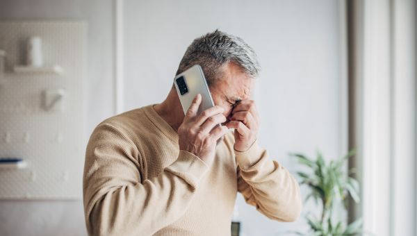 man talking to suicide prevention line