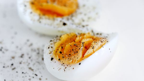 hard-boiled egg sprinkled with pepper