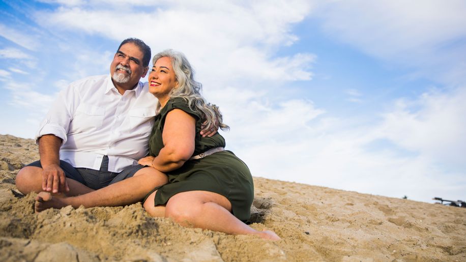 couple sitting on the beach