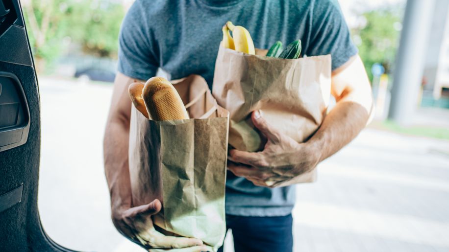 man with groceries