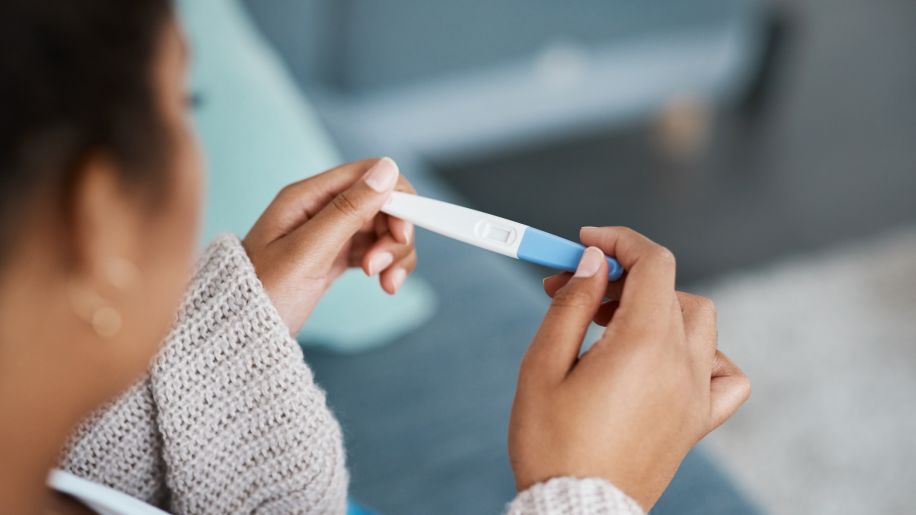 woman waiting for pregnancy test results