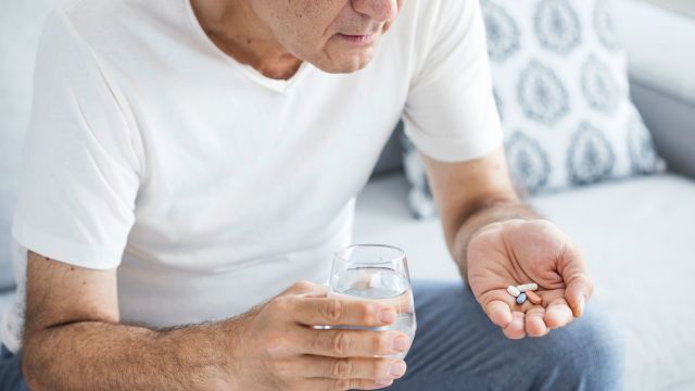 older man taking ed meds, man taking medication for erectile dysfunctioin