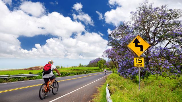 man riding bike in Hawaii