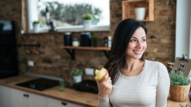 woman eating an apple