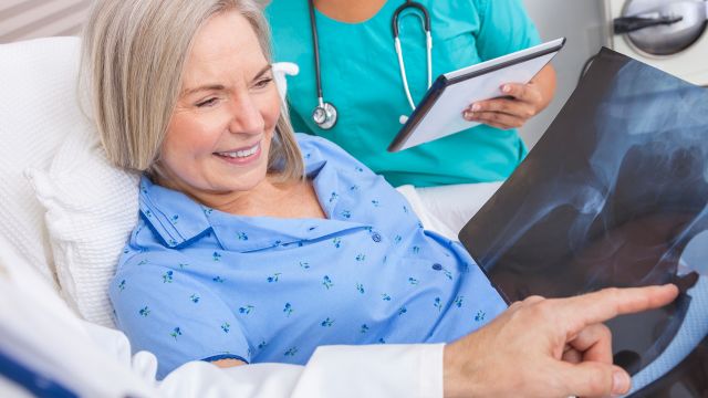 patient looking at xray