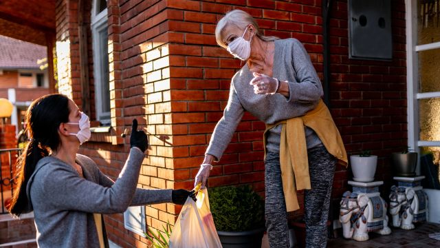 buying groceries for an older woman