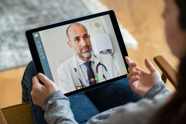 Man talking to doctor on video call