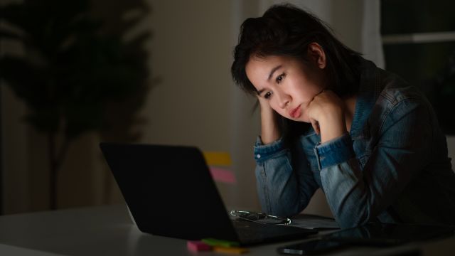 depressed woman on computer
