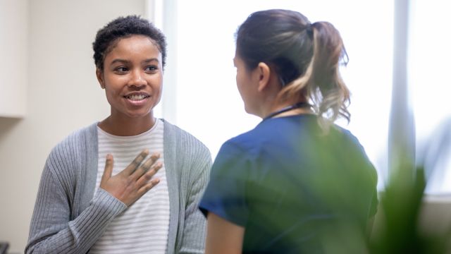 someone talking to their doctor