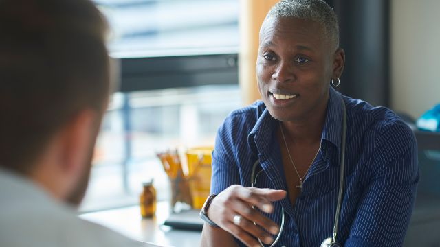 Doctor having a discussion with her patient.