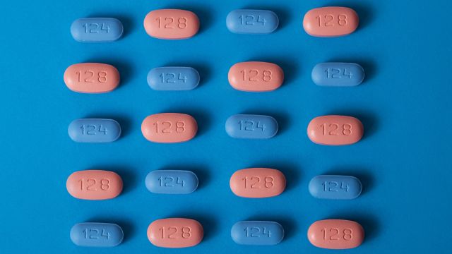 Antiretroviral drugs for treating HIV against a blue background.