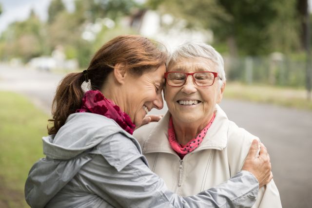 woman caring for her mother