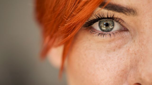 Closeup of a redhead woman's eye.