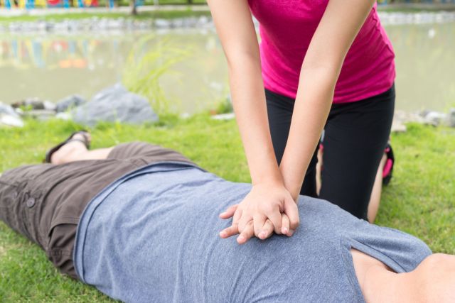 Bystander performs hands-only CPR (chest compressions) on person who collapsed due to sudden cardiac arrest