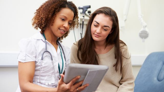 Doctor discussing anemia treatment with patient. 