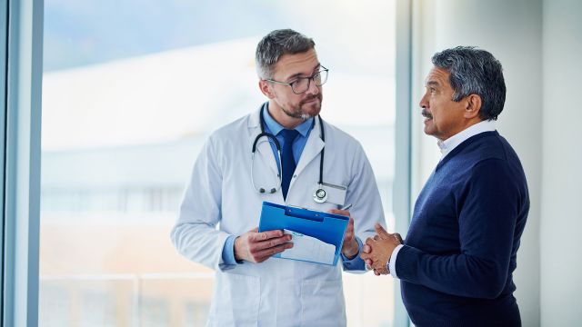 Doctor talking to a patient about the effects of soft tissue sarcoma.