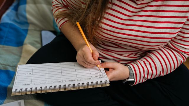 A woman keep track of food and nutrition as part of a weight loss program.