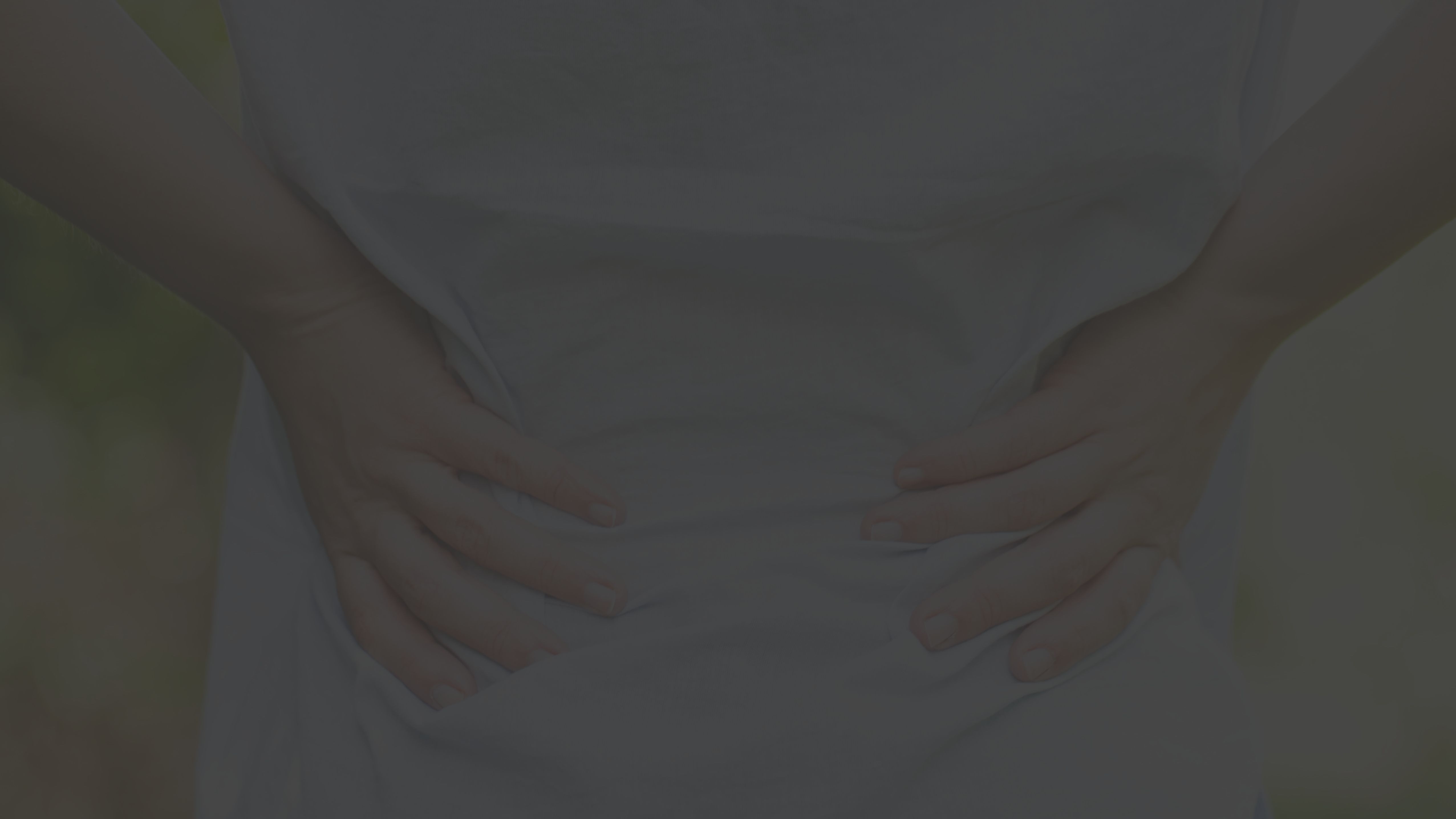 woman experiencing back pain