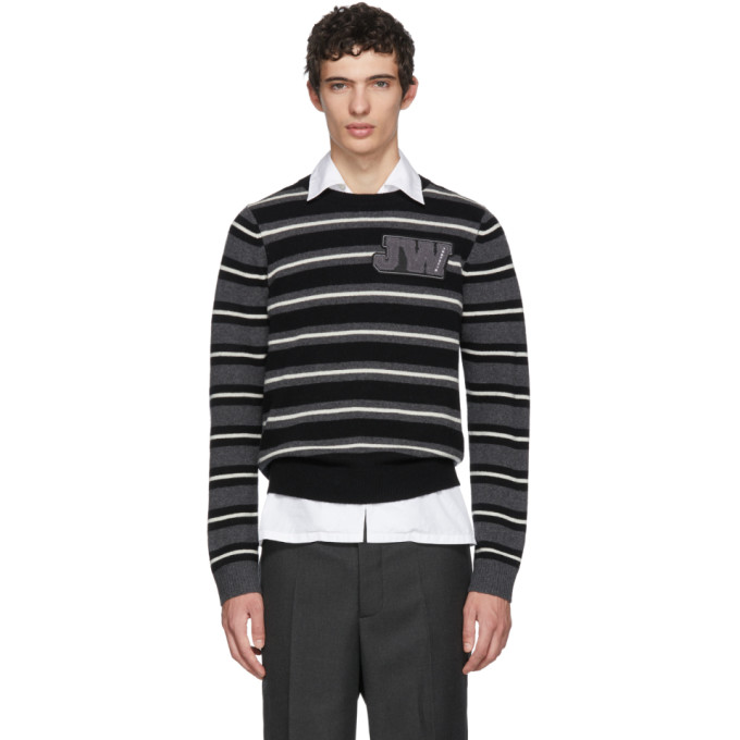 Click to view more detailed imagery on our partner's website Jw Anderson Striped Crew Neck Jumper In Blk.wht