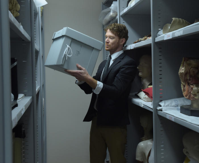 Curator Dr Ryan Jefferies in the musuem’s storage room with Meritamun’s mummified head. Picture: Paul Burston.