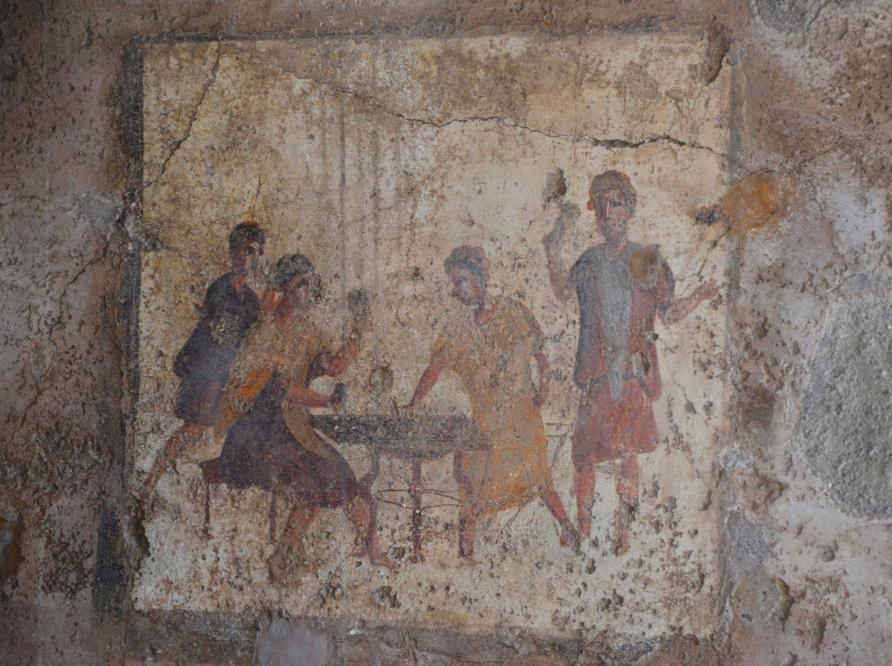 Wall painting showing a dice game at an inn.