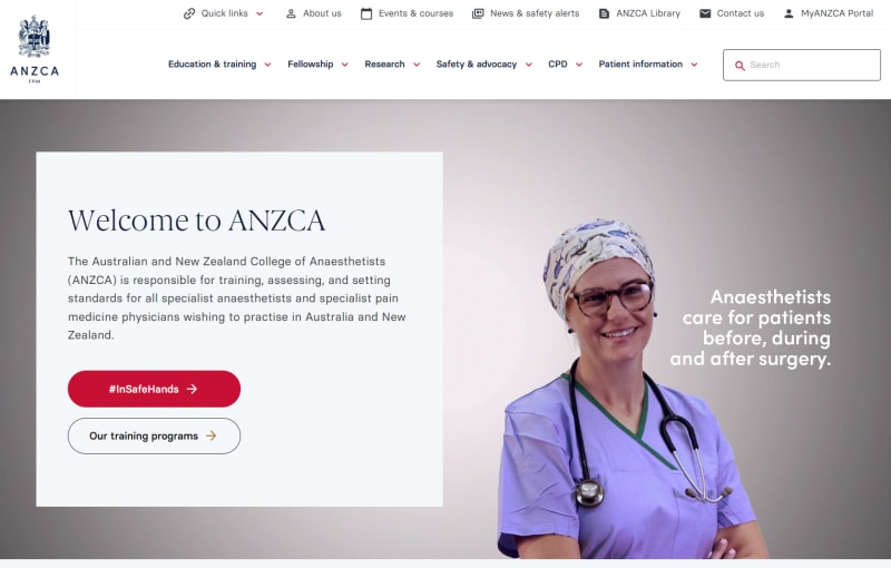 A smiling anaesthetist in scrubs and a patterned surgical cap, with a stethoscope around her neck.